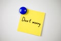 Yellow sticker inscription DonÃ¢â¬â¢t worry Royalty Free Stock Photo